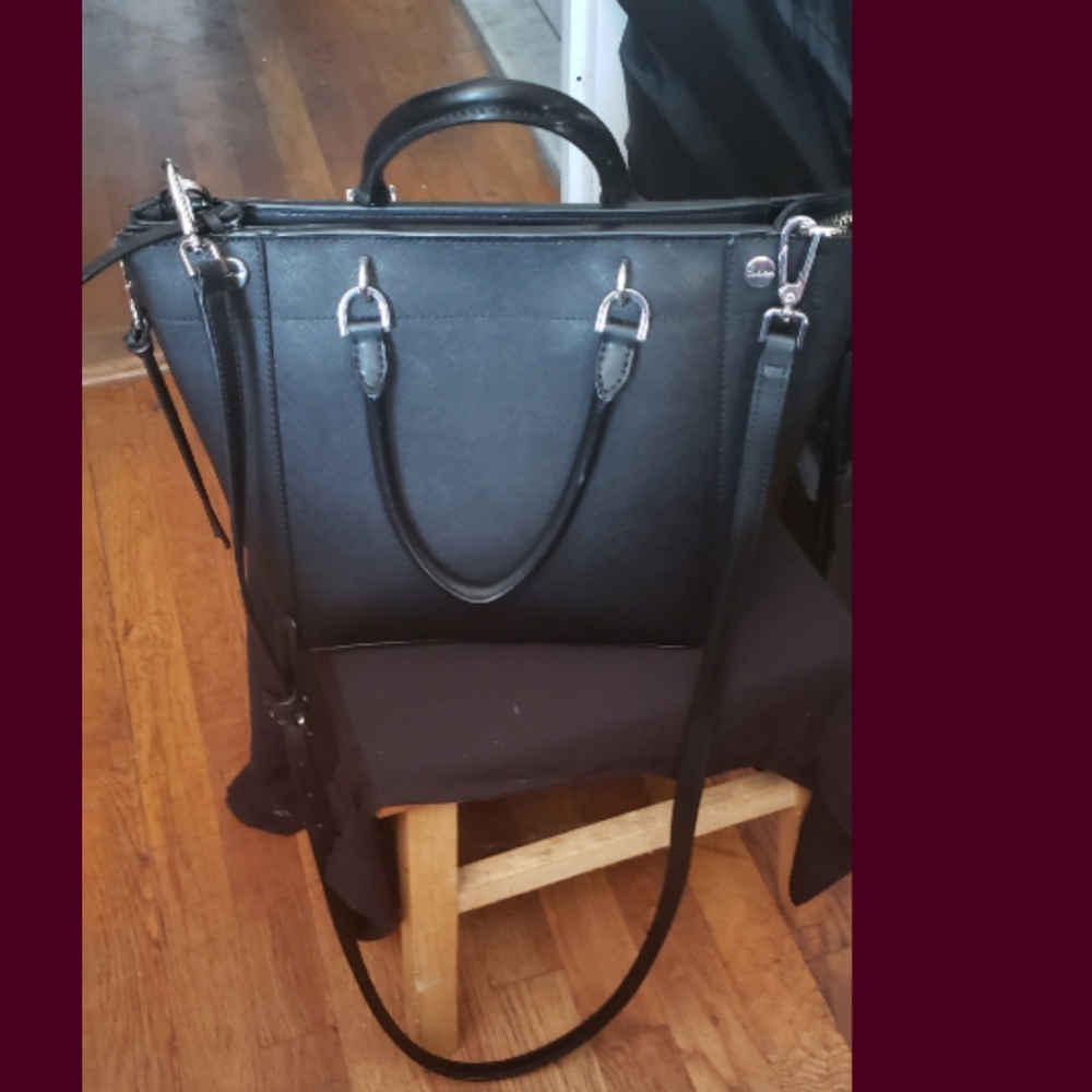 New faux leather Calvin Klein black and silver handbag.